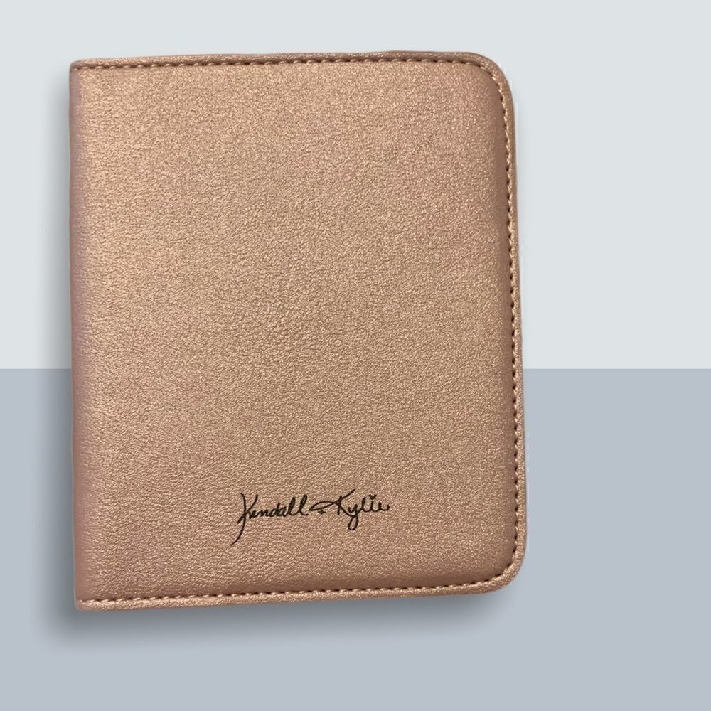 2/40$$ Rose Gold Kendall & Kylie Passport Holder